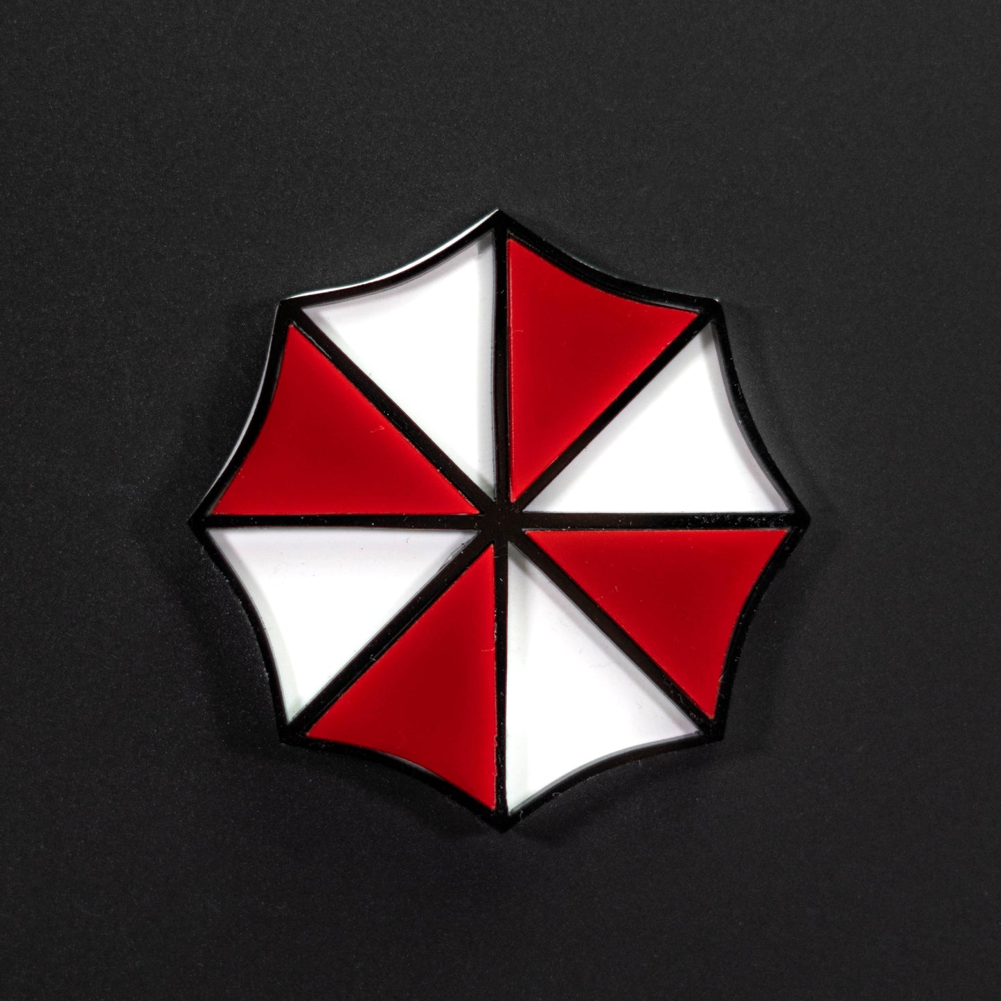 Insignia de icono inspirada en Umbrella Corp