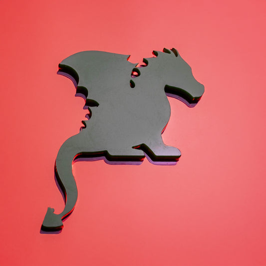 Badge d'icône de silhouette de dragon assis