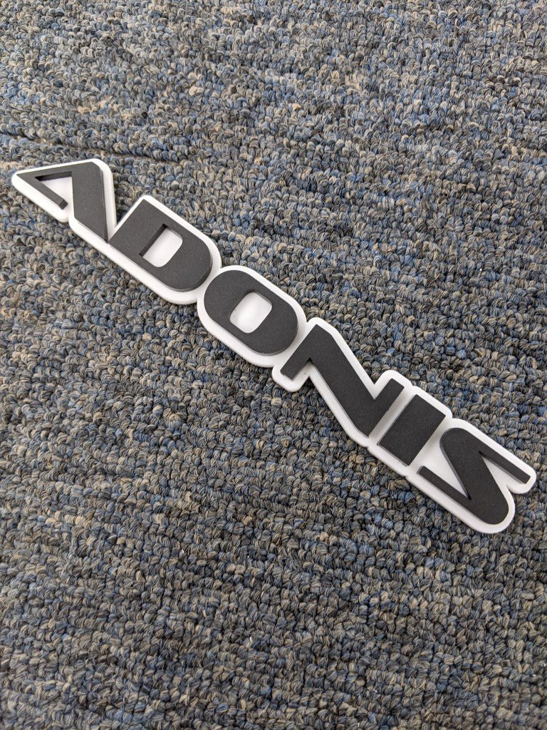 Adonis Car Badge - Matte Black On White - OEM Font - Atomic Car Concepts