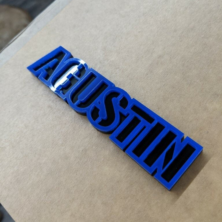 Agustin Car Badge - Blue On Gloss Black - Stencil Font - Tape Mount - Atomic Car Concepts