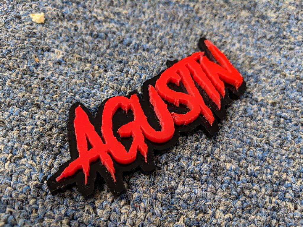 Agustin Car Badge - Red On Gloss Black - Aggressive Font - Atomic Car Concepts