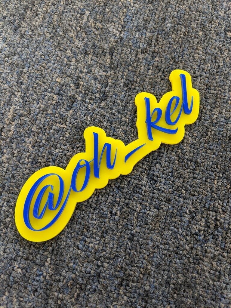 @Oh_Kel Car Badge - Blue On Yellow - Script Font - Atomic Car Concepts