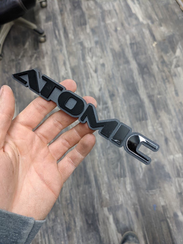 Atomic Car Badge - Gloss Black On Matte Black - OEM Font - Atomic Car Concepts