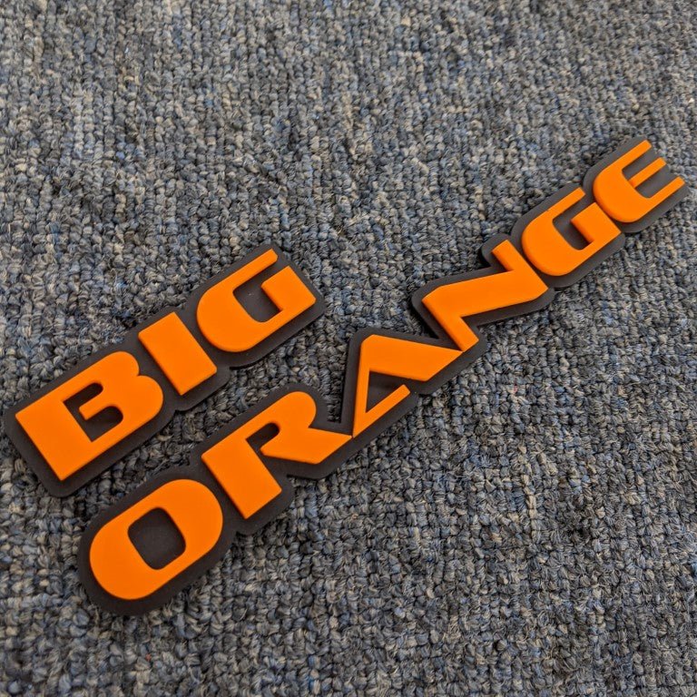 Big Orange Car Badge - Orange On Matte Black - OEM Font - Atomic Car Concepts