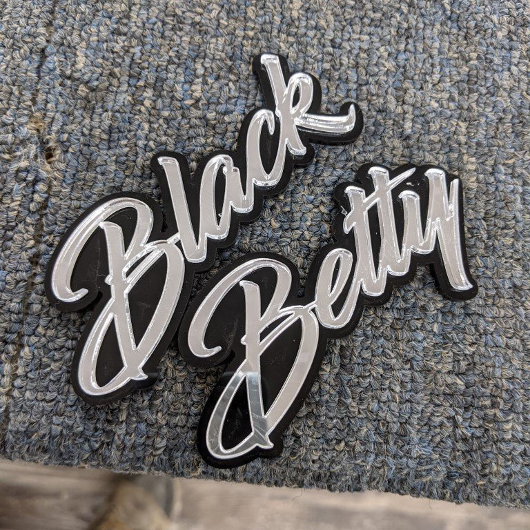 Black Betty Car Badge - Mirror Silver On Gloss Black - Script Font - Atomic Car Concepts