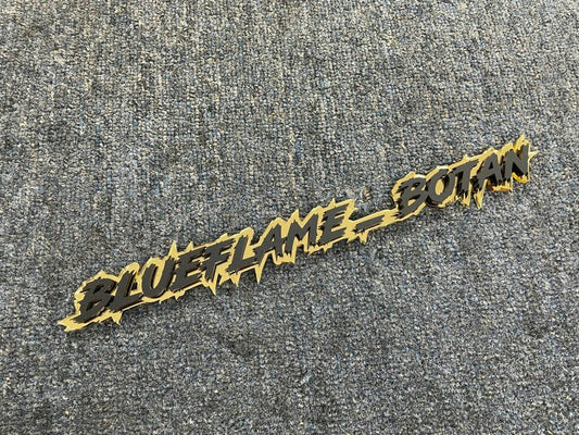 Blueflame_Botam Car Badge - Matte Black On Mirror Gold - Lightning Font - Atomic Car Concepts