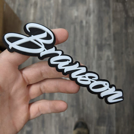 Branson Car Badge - White On Gloss Black - Script Font (Copy) - Tape Mount - Atomic Car Concepts