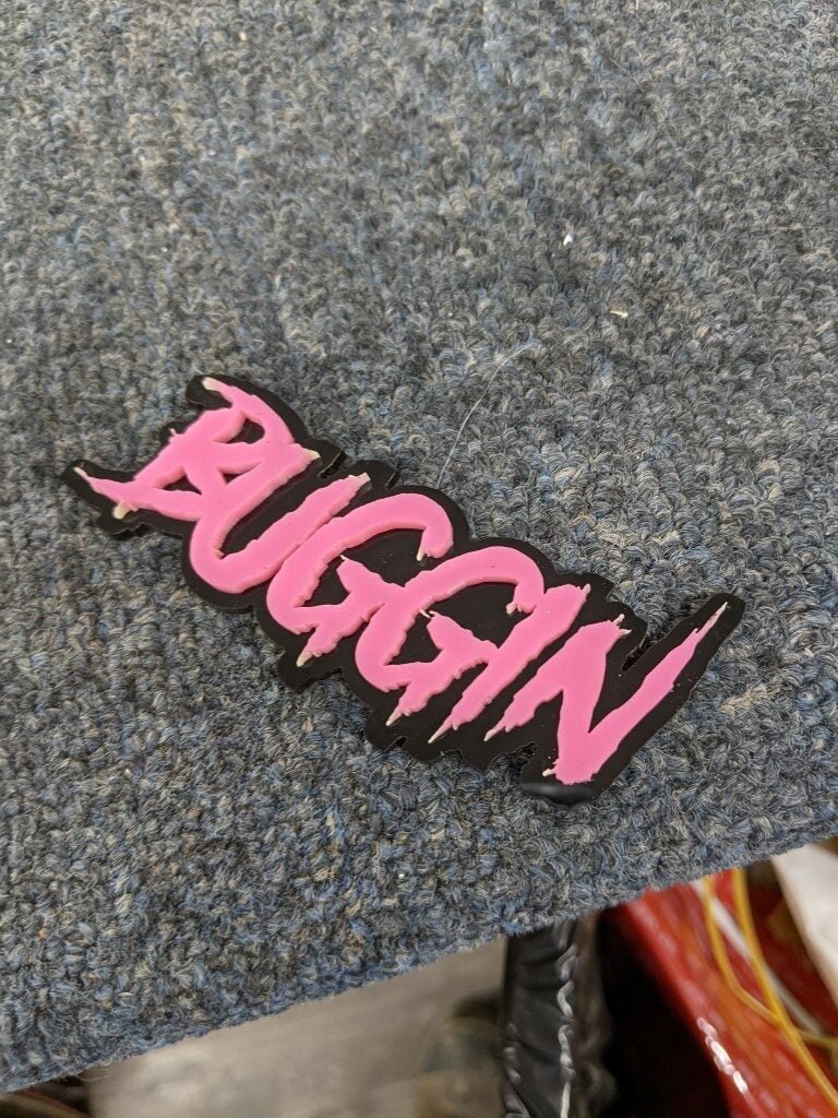 Buggin Car Badge - Pink On Gloss Black - Aggressive Font - Atomic Car Concepts