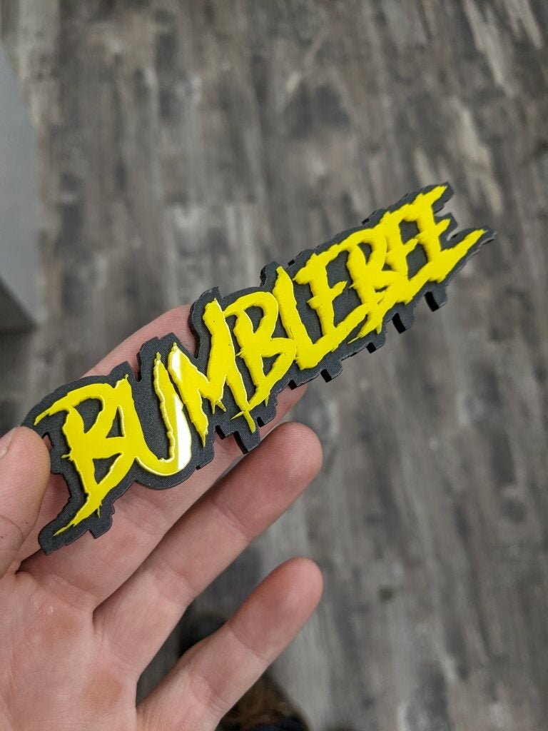 Badge de voiture Bumblebee - Jaune sur noir mat - Police agressive