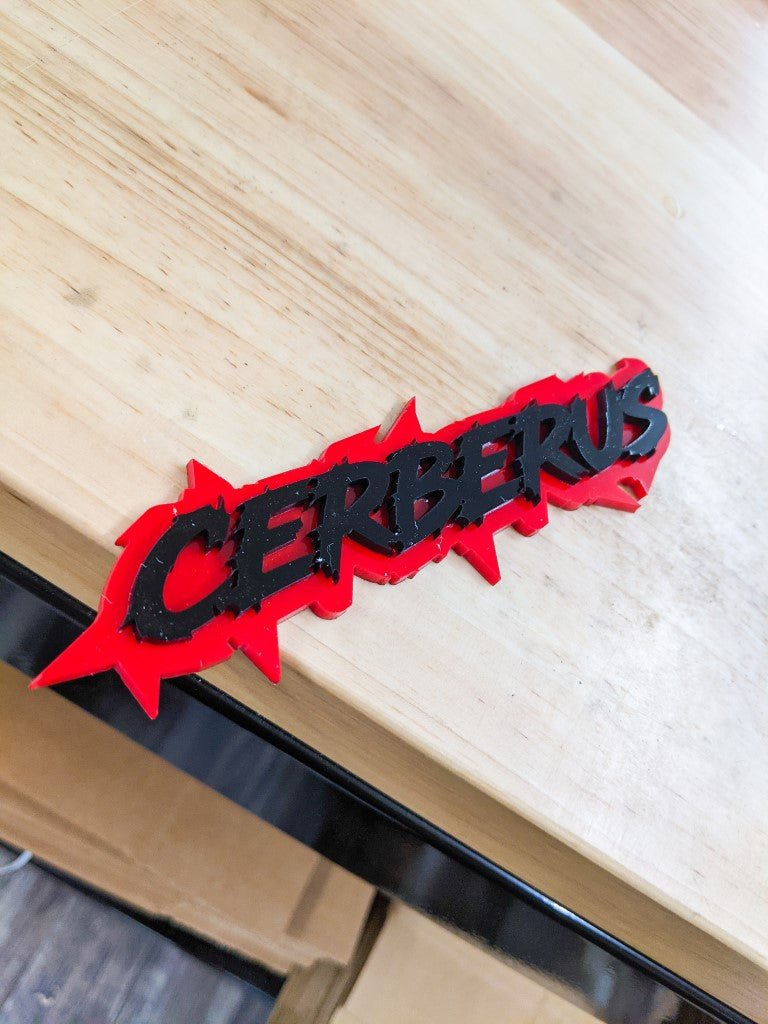 Cerberus Car Badge - Gloss Black On Red - Lightning Font - Atomic Car Concepts