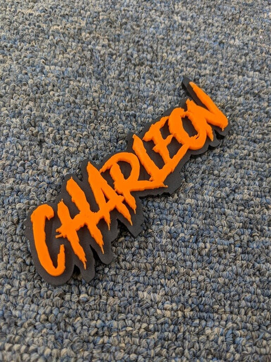 Charleon Car Badge - Orange On Matte Black - Aggressive Font