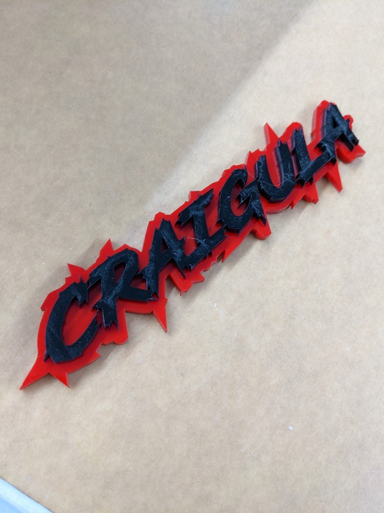 Craigula Car Badge - Gloss Black On Red - Lightning Font - Atomic Car Concepts