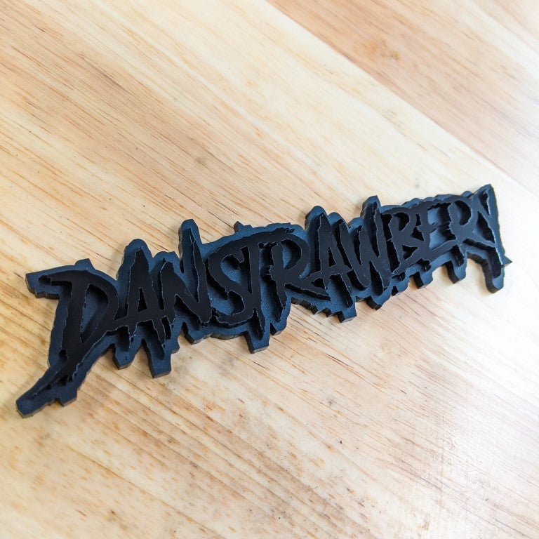 Danstrawbery Car Badge - Gloss Black On Matte Black - Aggressive Font - Atomic Car Concepts