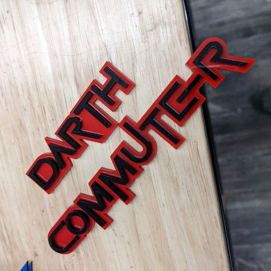 Darth Commuter Car Badge - Gloss Black On Red - Squid Font - Tape Mount - Atomic Car Concepts