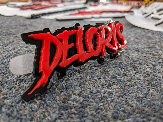 Deloris Car Badge - Red on Gloss Black - Aggressive Font