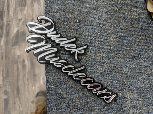 Dudek Musclecars Car Badge - Mirror Silver On Gloss Black - Script Font - Atomic Car Concepts