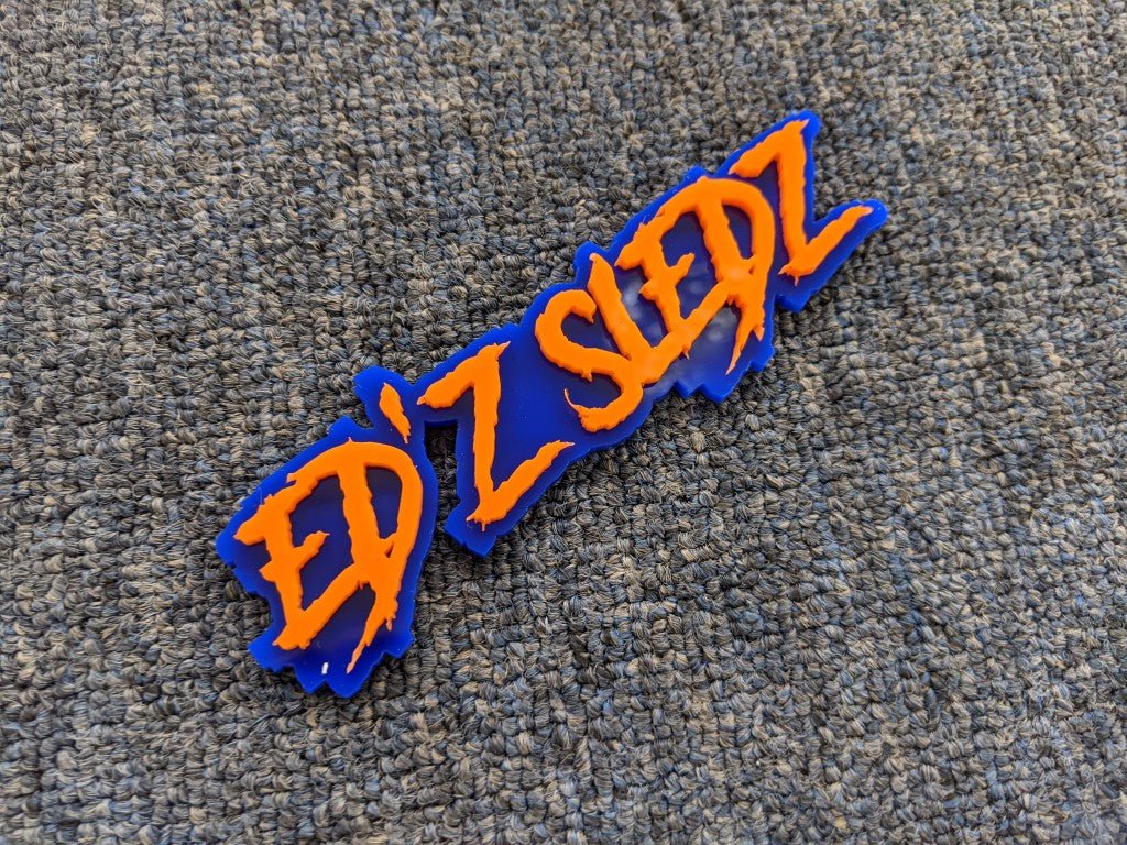 Ed'Z Sledz Car Badge - Orange On Blue - Aggressive Font - Atomic Car Concepts