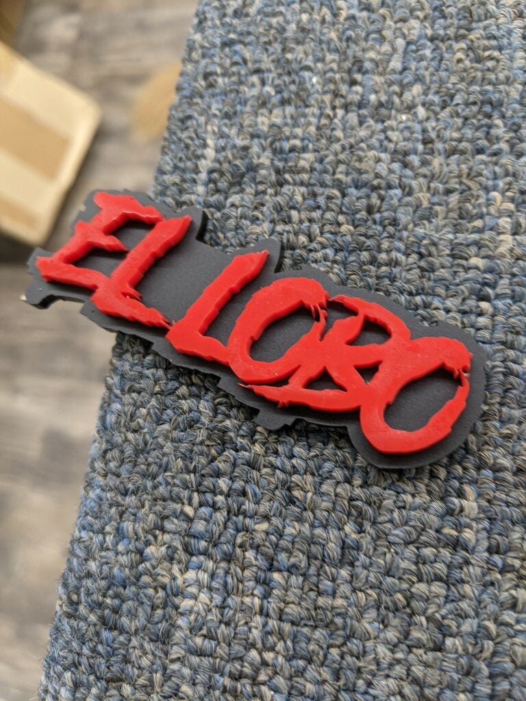 El Lobo Car Badge - Red On Matte Black - Aggressive Font - Atomic Car Concepts