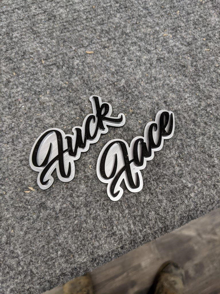 Fuck Face Car Badge - Gloss Black On White - Script Font - Atomic Car Concepts