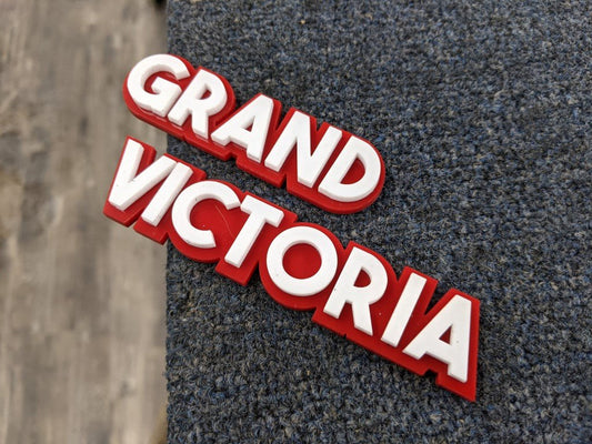 Grand Victoria Car Badge - White On Red - Block Font