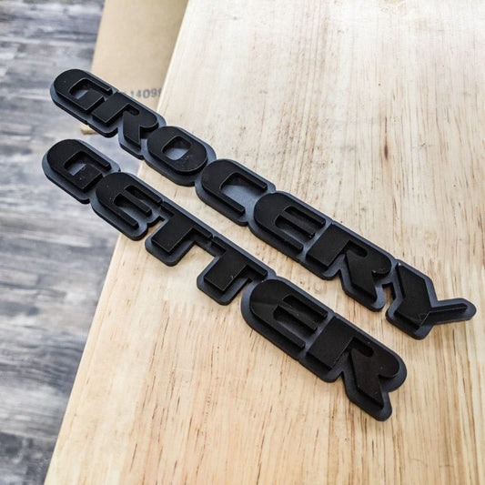 Grocery Getter Car Badge - Gloss Black on Matte Black - OEM Font- Tape Mounting