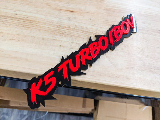 K5 Turbo BOV Car Badge - Red on Gloss Black - Lightning Font - Tape Mounting - Atomic Car Concepts