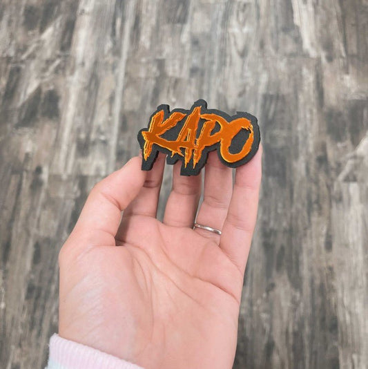 Kapo Car Badge - Mirror Orange On Matte Black - Aggressive Font - Atomic Car Concepts