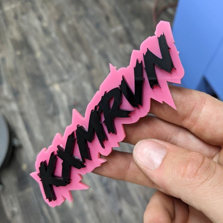 Kxmrvn Car Badge - Gloss Black On Pink - Lightning Font - Atomic Car Concepts