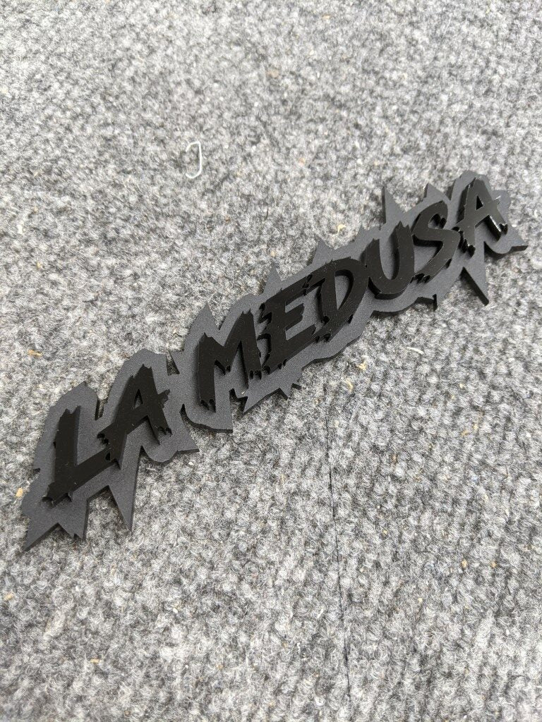 La Medusa Car Badge - Gloss Black on Matte Black - Lightning Font - Atomic Car Concepts