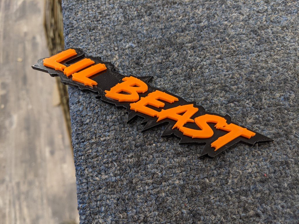 Lil Beast Car Badge - Orange On Gloss Black - Lightning Font - Atomic Car Concepts