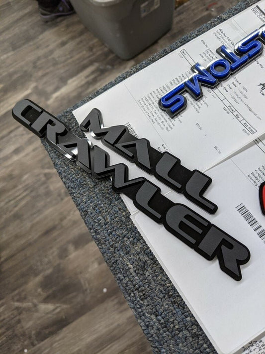 Mall Crawler Car Badge - Matte Black On Gloss Black - OEM Font - Atomic Car Concepts