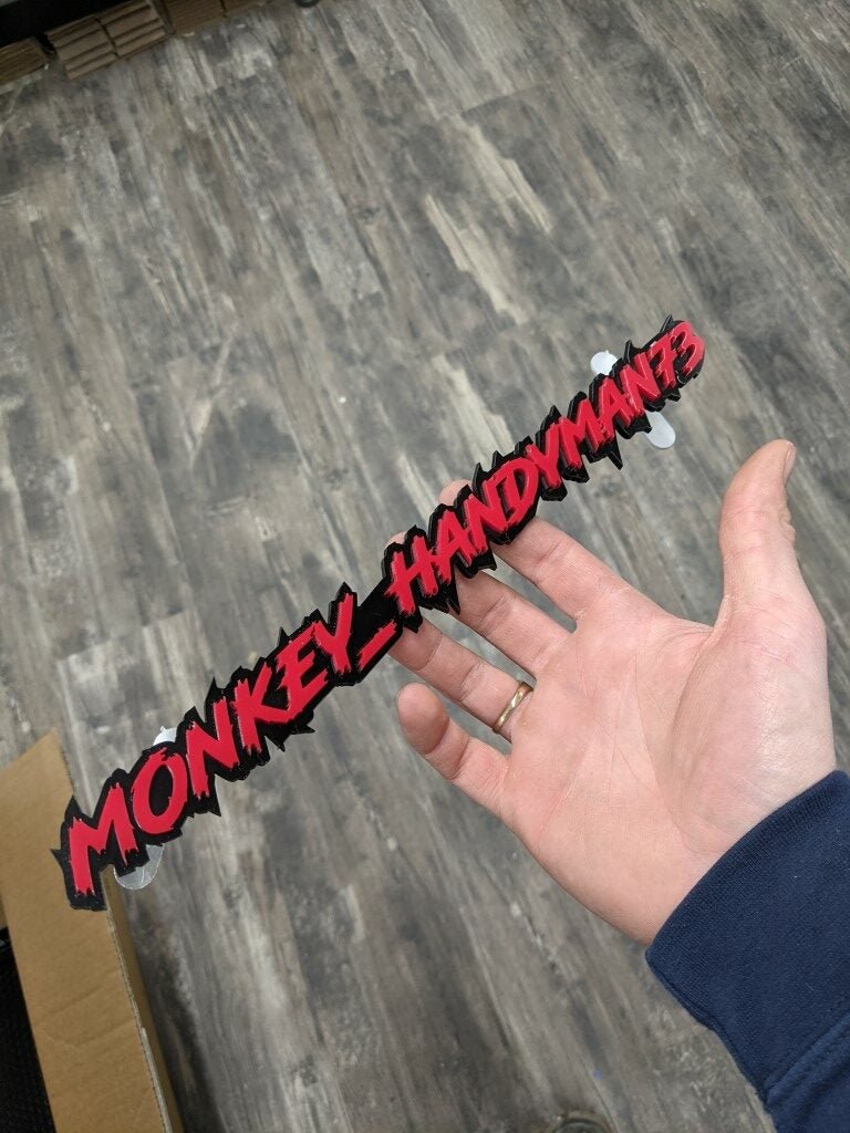 Monkey_Handyman73 Car Badge - Red On Gloss Black - Lightning Font - Atomic Car Concepts