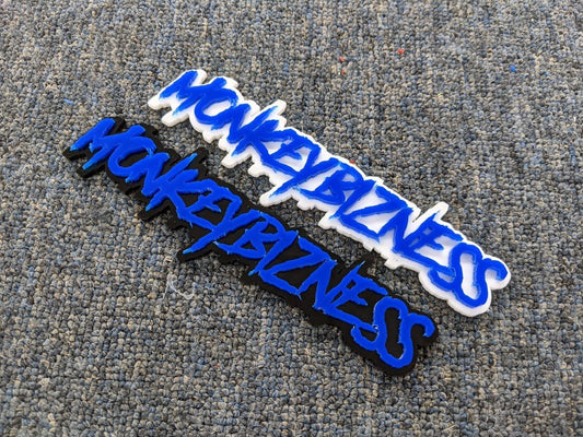 Monkeybizness Car Badge - Blue On Gloss Black / White - Aggressive Font - Atomic Car Concepts