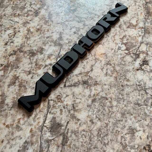 Mudhorn Car Badge - Matte Black On Gloss Black - OEM Font - Atomic Car Concepts