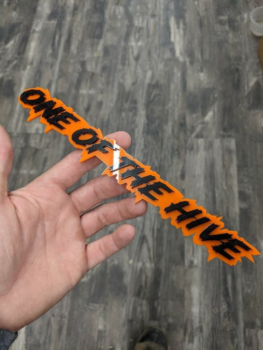 One Of The Hive Car Badge - Gloss Black On Orange - Lightning Font - Atomic Car Concepts