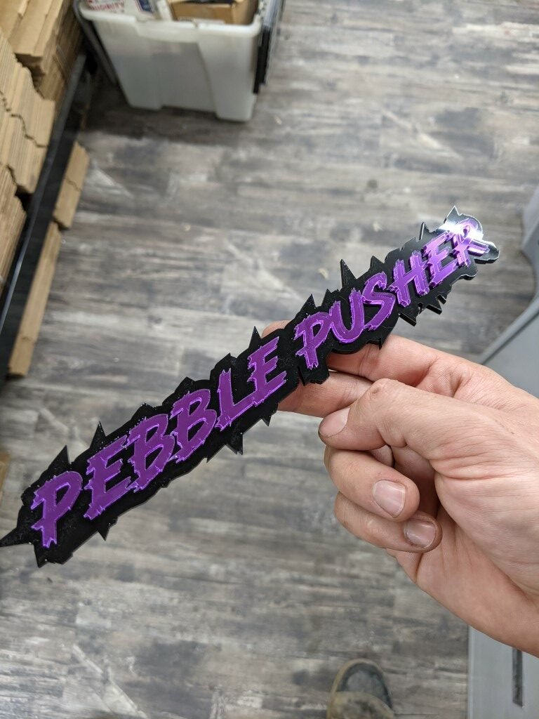 Pebble Pusher Car Badge - Mirror Purple on Gloss Black - Lightning Font - Atomic Car Concepts