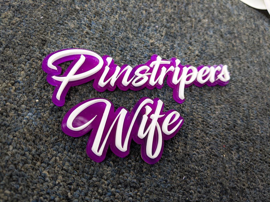 Pinstripers Wife Car Badge - White on Purple - Script Font - Tape Mounting - Atomic Car Concepts