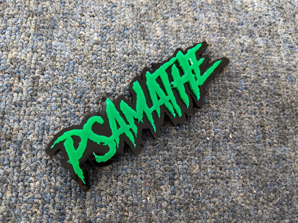 Psamathe Car Badge - Green on Gloss Black - Aggressive Font - Tape Mounting - Atomic Car Concepts