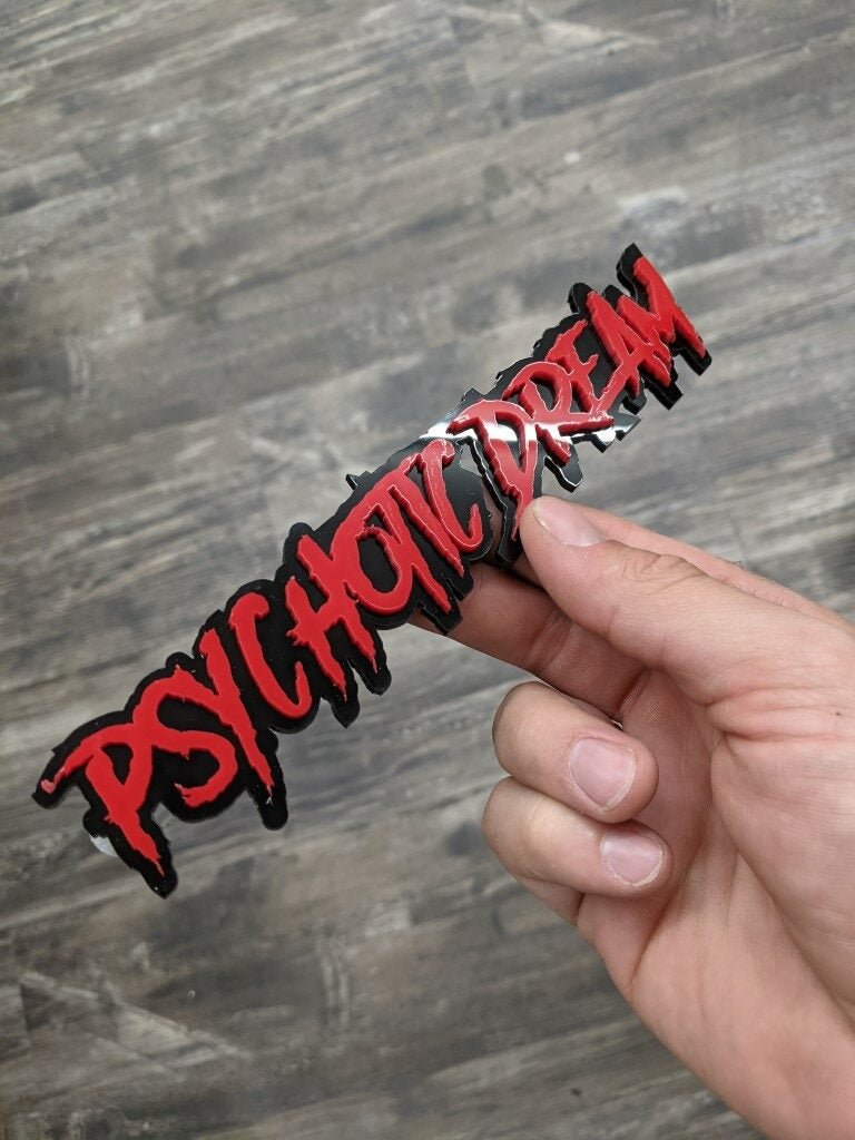 Psychotic Dream Car Badge - Red On Gloss Black - Aggressive Font - Atomic Car Concepts