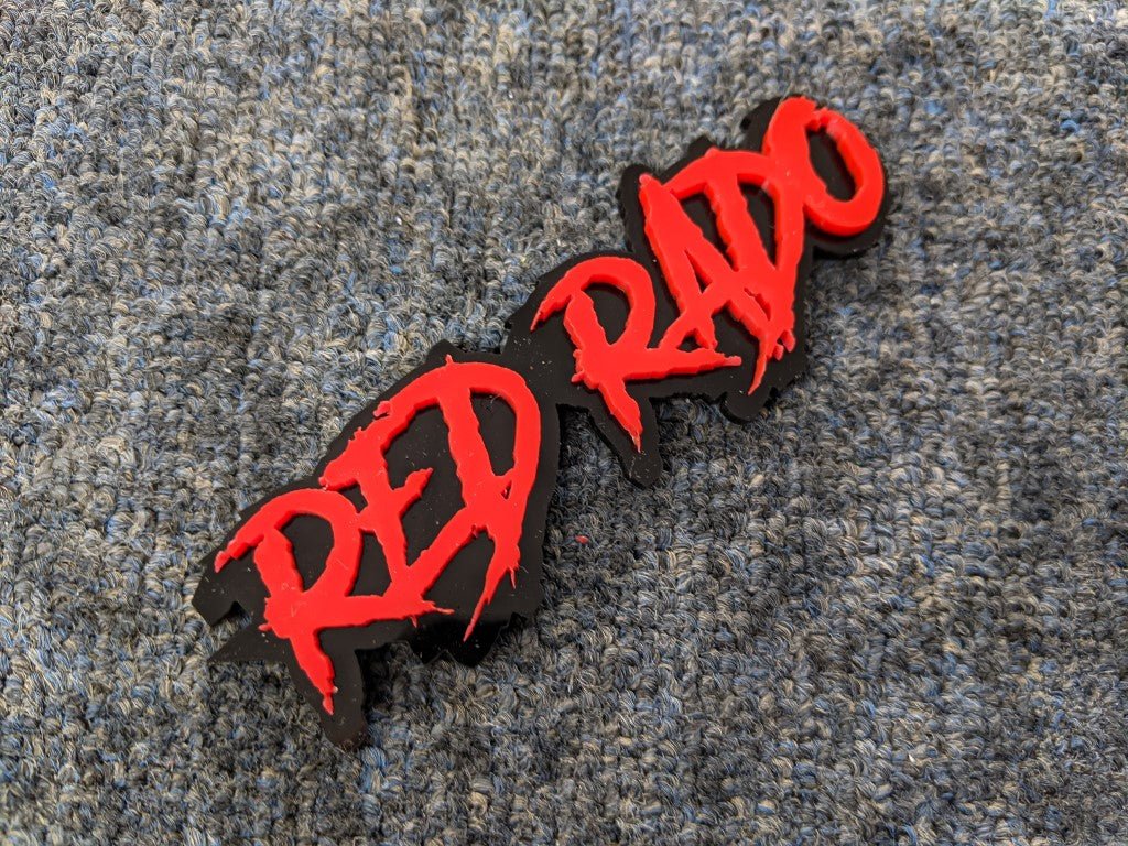 Red Rado Car Badge - Red on Gloss Black - Aggressive Font - Tape Mounting - Atomic Car Concepts