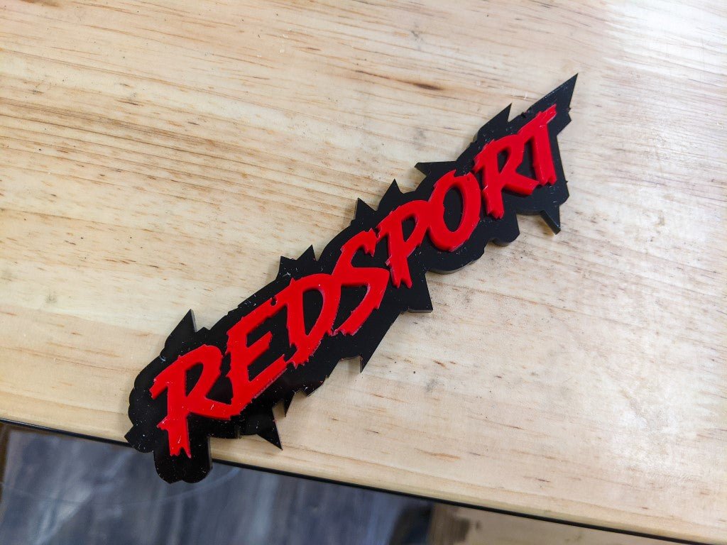 Redsport Car Badge - Red on Gloss Black - Lightning Font - Tape Mounting - Atomic Car Concepts