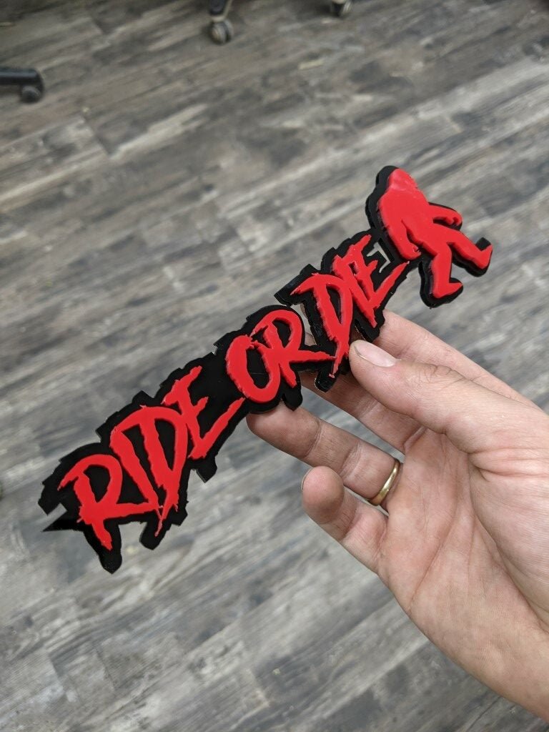 Ride Or Dide Yeti Car Badge - Red On Gloss Black - Aggressive Font - Atomic Car Concepts