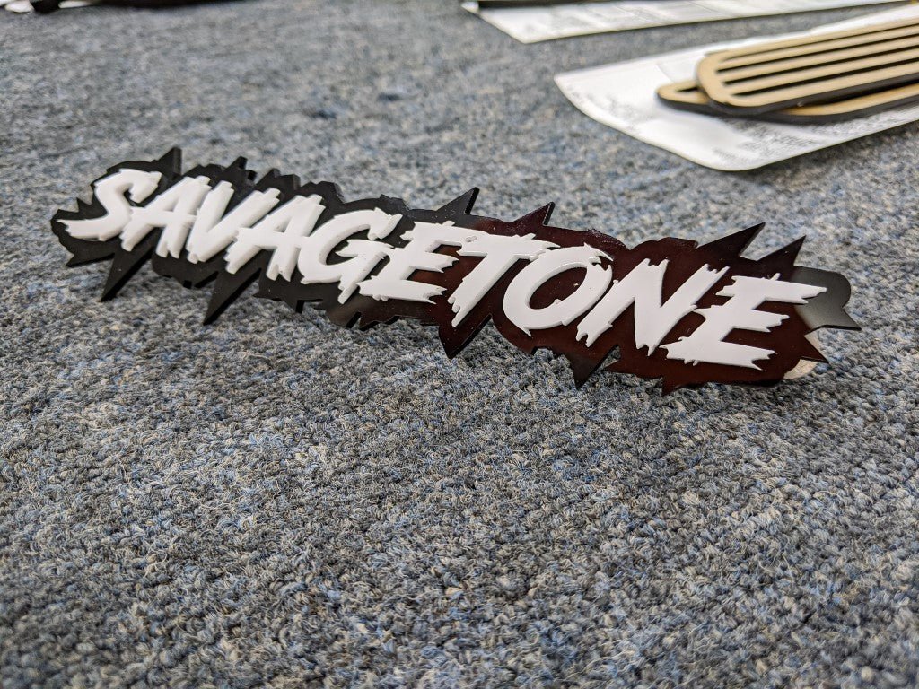 Savagetone Car Badge - White on Gloss Black - Lightning Font - Tape Mounting - Atomic Car Concepts