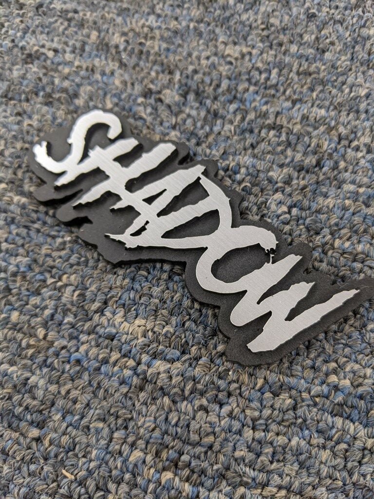 Shadow Car Badge - Brushed Silver On Matte Black - Aggressive Font - Atomic Car Concepts