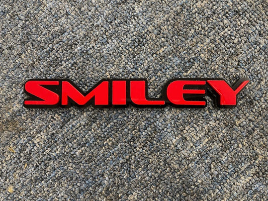 Smiley Car Badge - Red On Gloss Black - OEM Font - Atomic Car Concepts