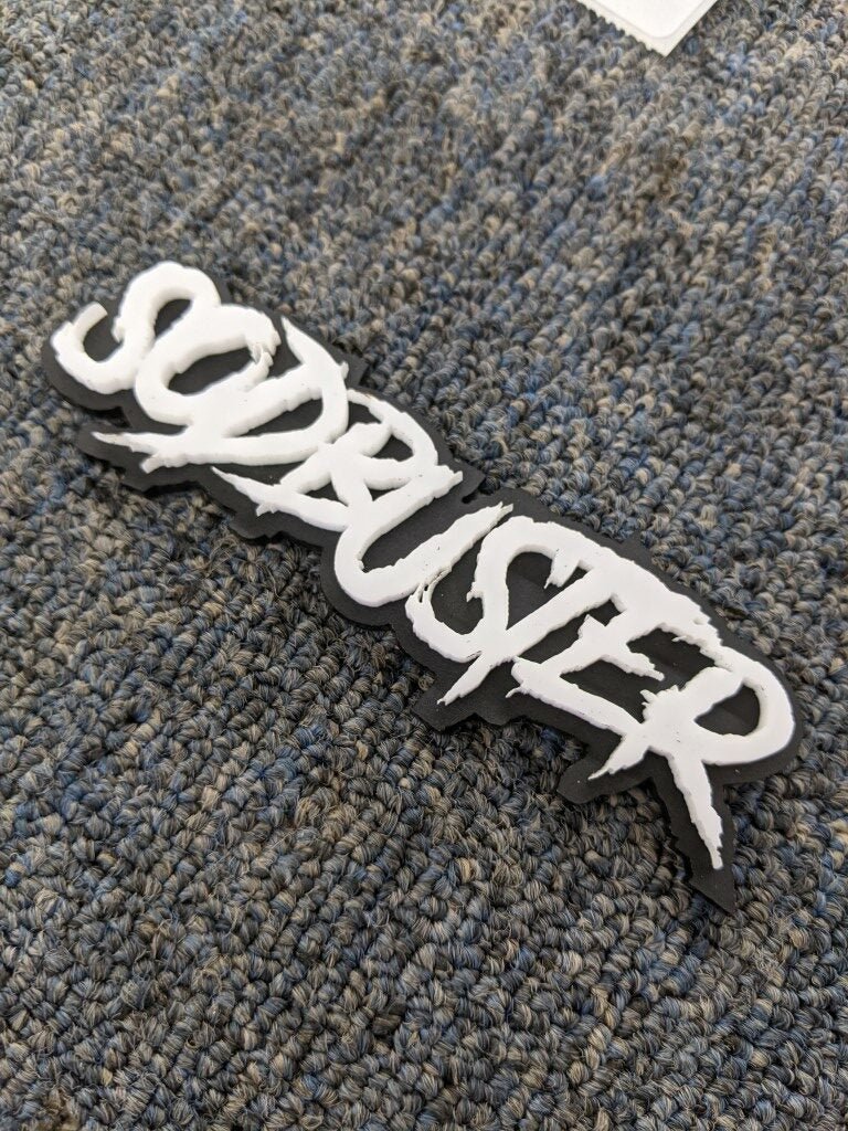 Sodbuster Car Badge - White On Matte Black - Aggressive Font - Atomic Car Concepts