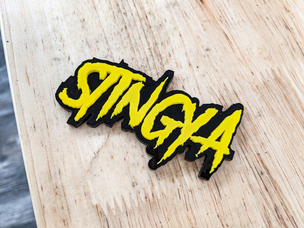 Stingya Car Badge - Yellow on Gloss Black - Aggressive Font - Tape Mounting - Atomic Car Concepts