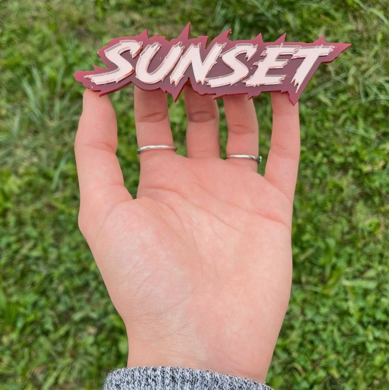 Sunset Car Badge - Brushed Silver On Pink - Lightning Font - Atomic Car Concepts