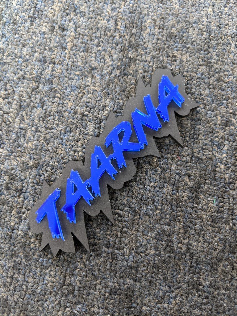 Taarna Car Badge - Mirror Blue on Matte Black - Lightning Font - Atomic Car Concepts