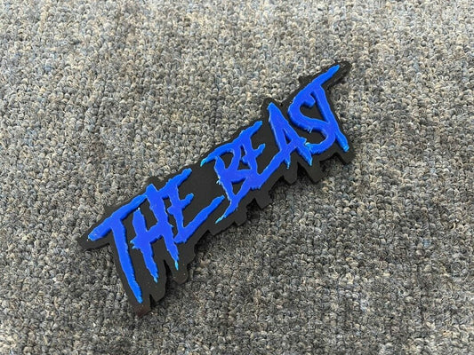 The Beast Car Badge - Blue On Matte Black - Aggressive Font - Atomic Car Concepts